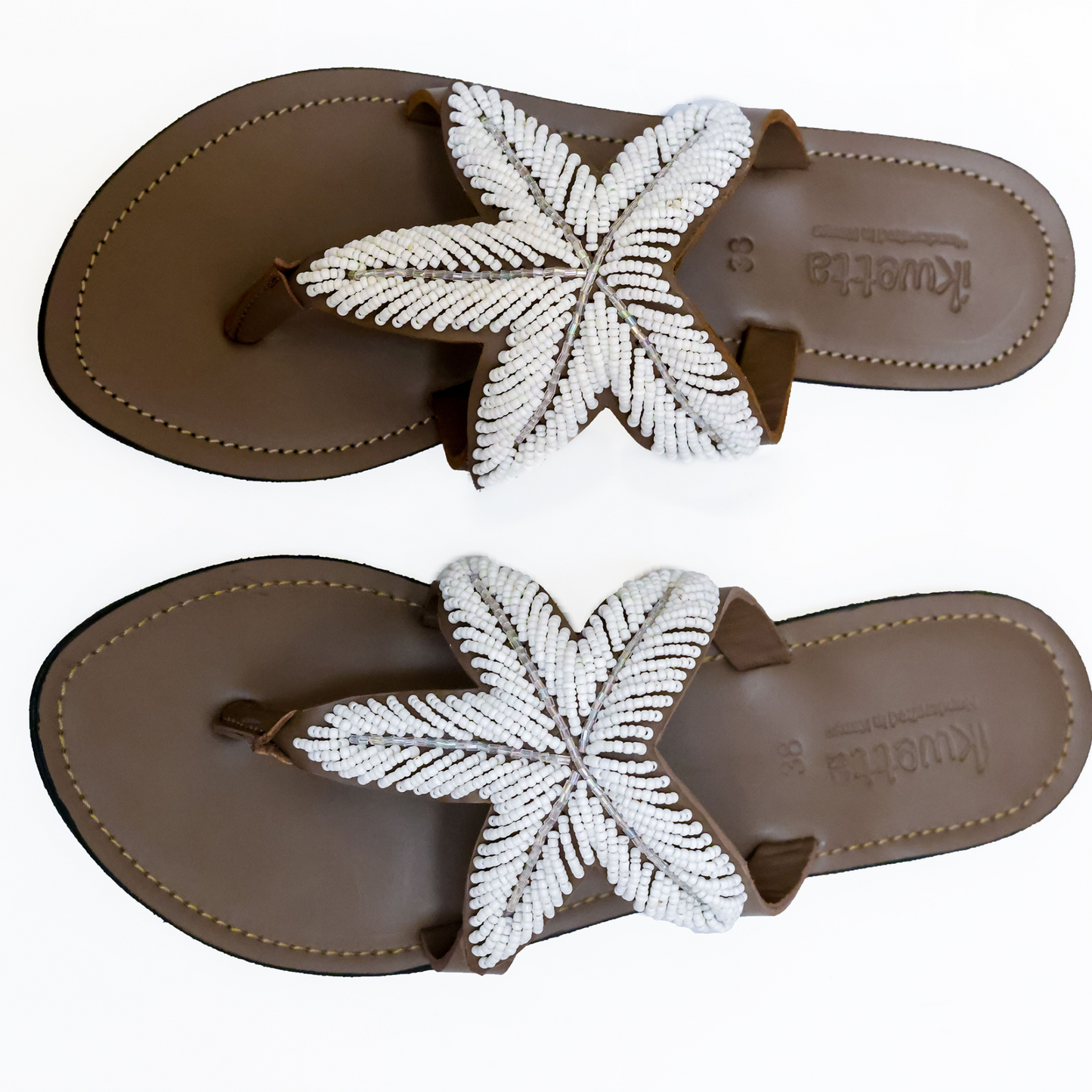 Kaly sandals in in taupe smooth leather and Maasai beaded upper