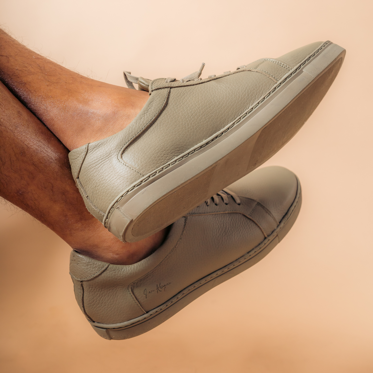 I am Kenyan sneakers in brown milled leather and royal sole