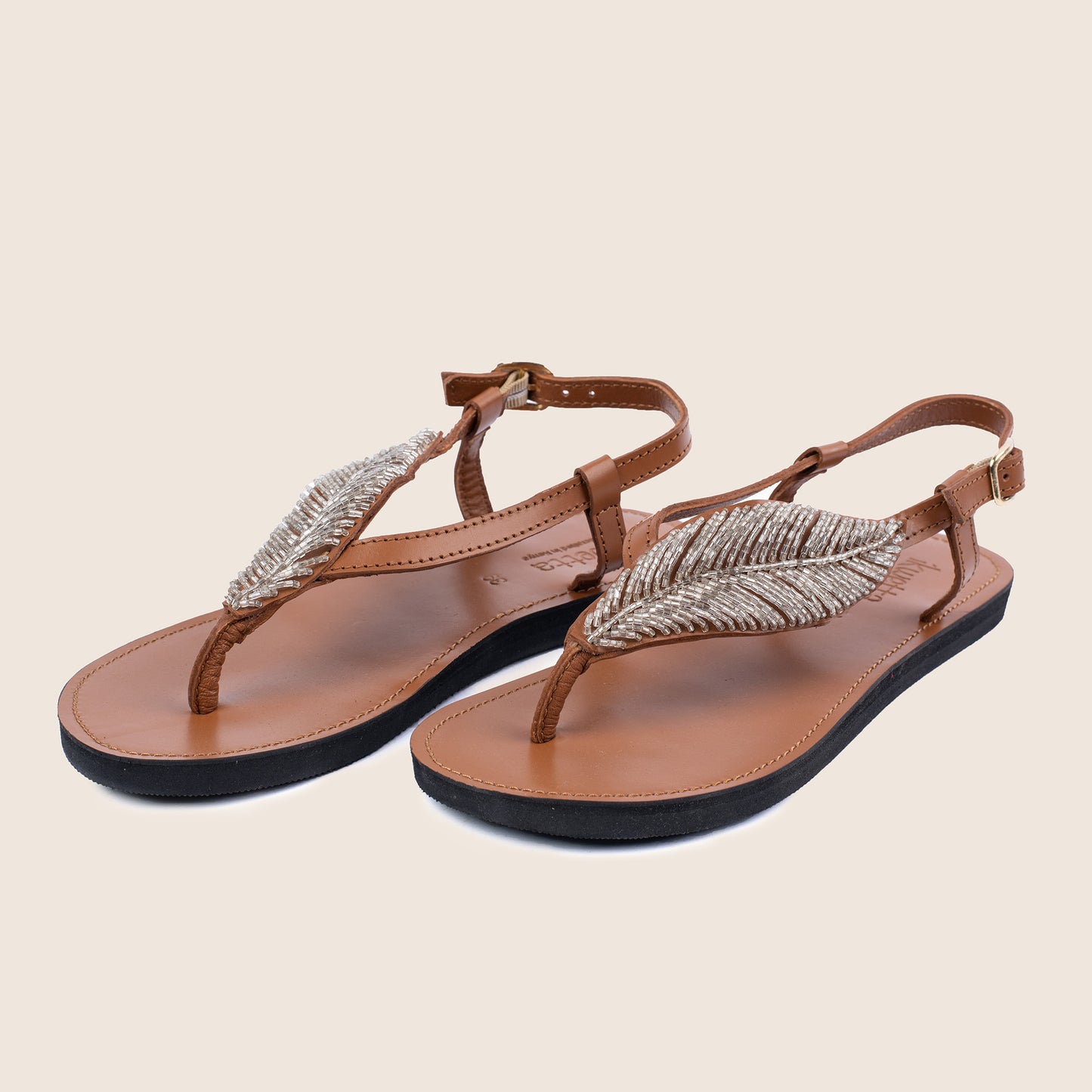 Tropical luxe sandals in Caramel smooth leather with a leaf style beaded strap.
