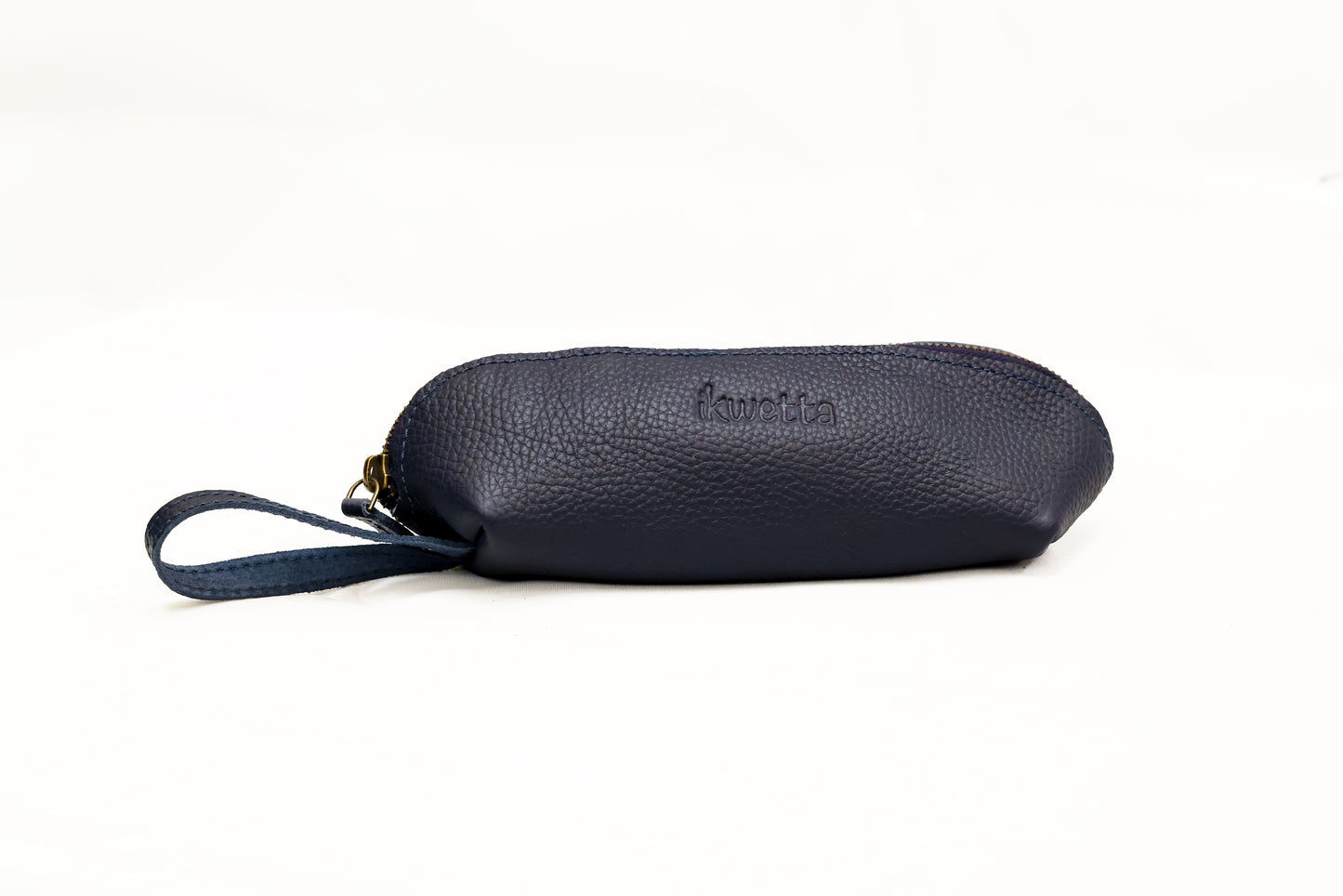 Pencil pouch in navy natural dried milled leather