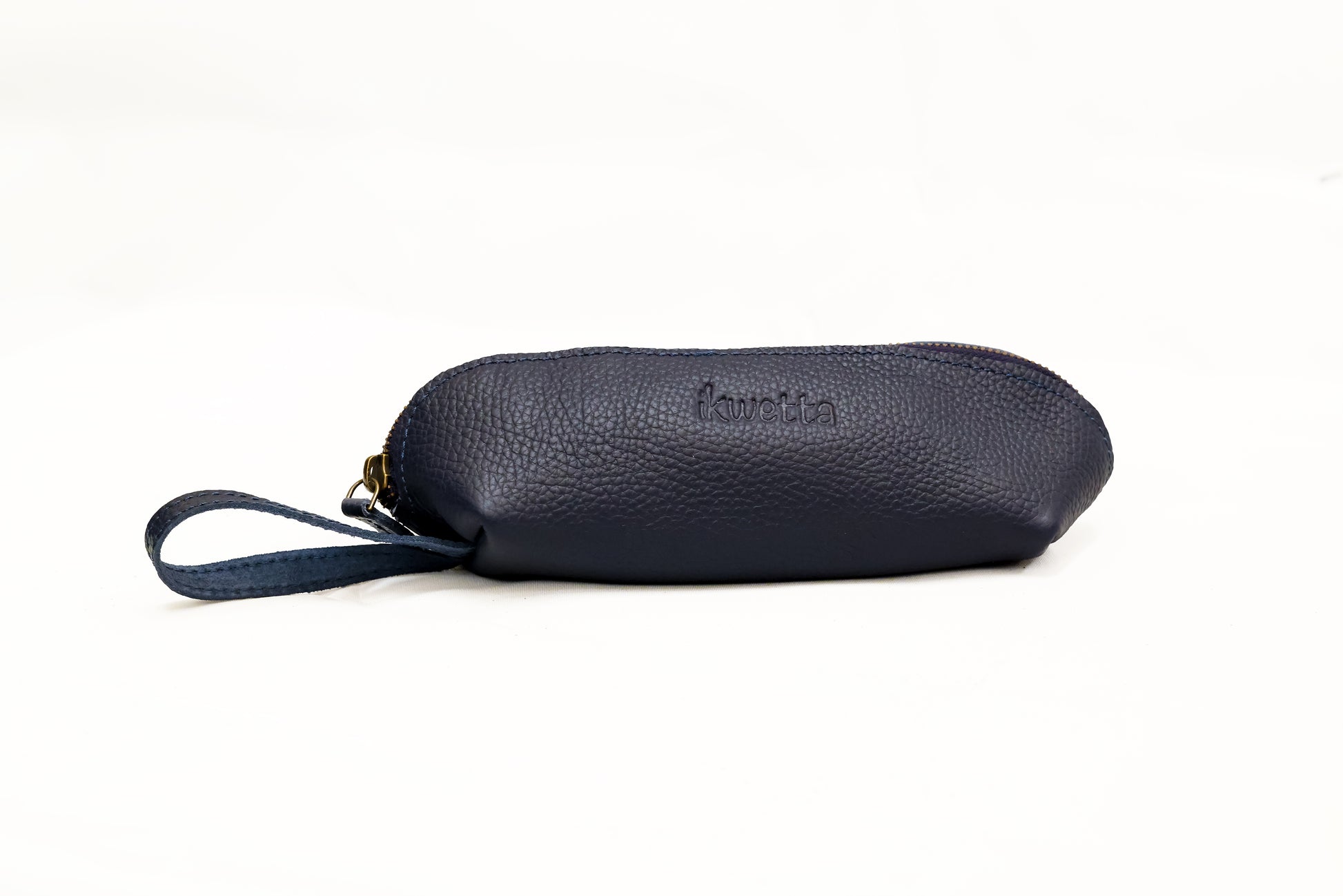 Pencil pouch in navy natural dried milled leather