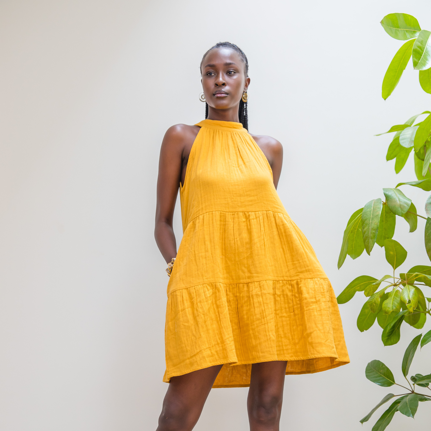 Golden Dusk Jua halter dress featuring adjustable back tie in breathable double cheesecloth.