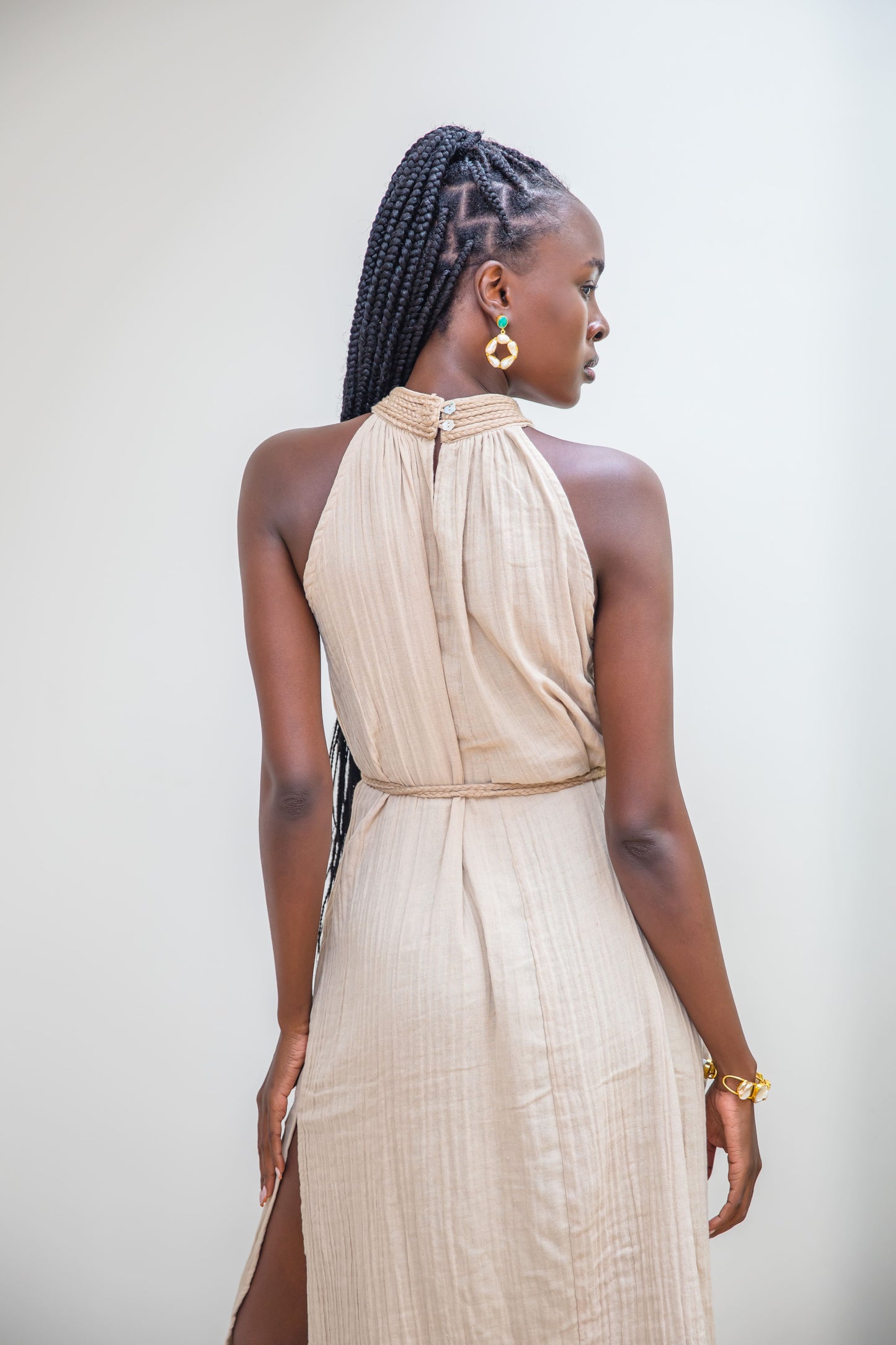 Honey Nairobi halter dress with artisanal handwoven neckline and flowing double cheesecloth.