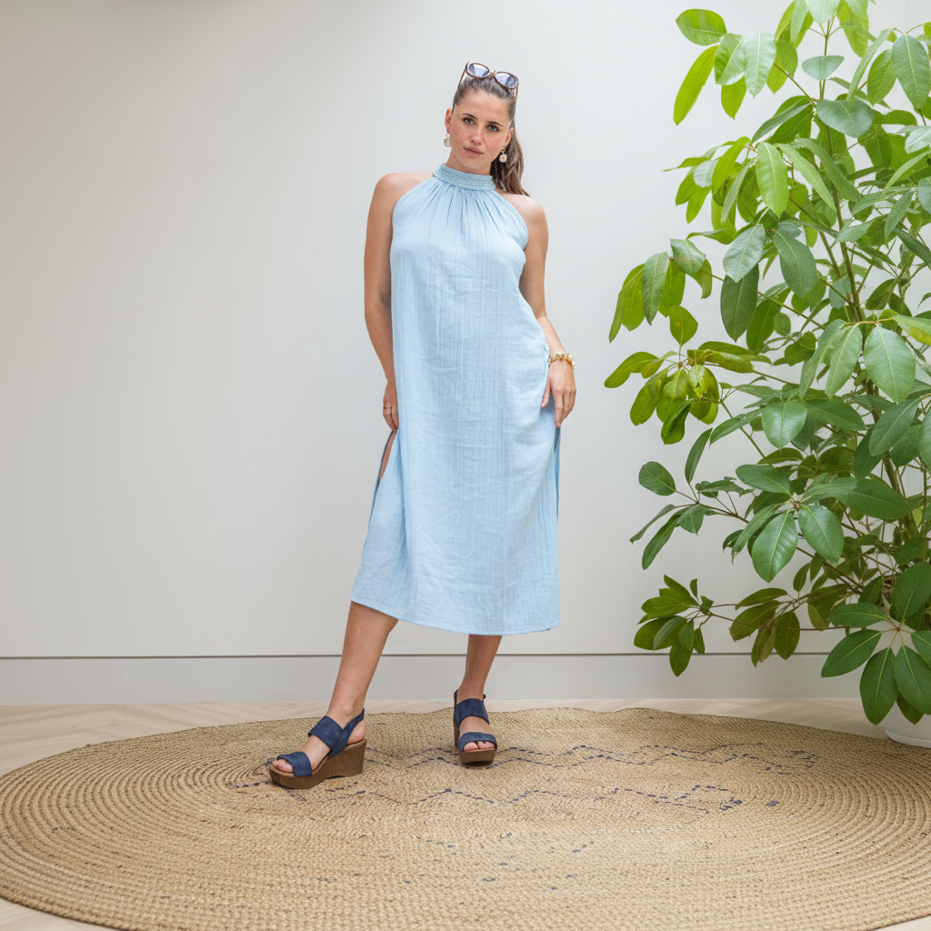 Nairobi halter dress in Sky featuring intricate handwoven neckline and double cheesecloth body.