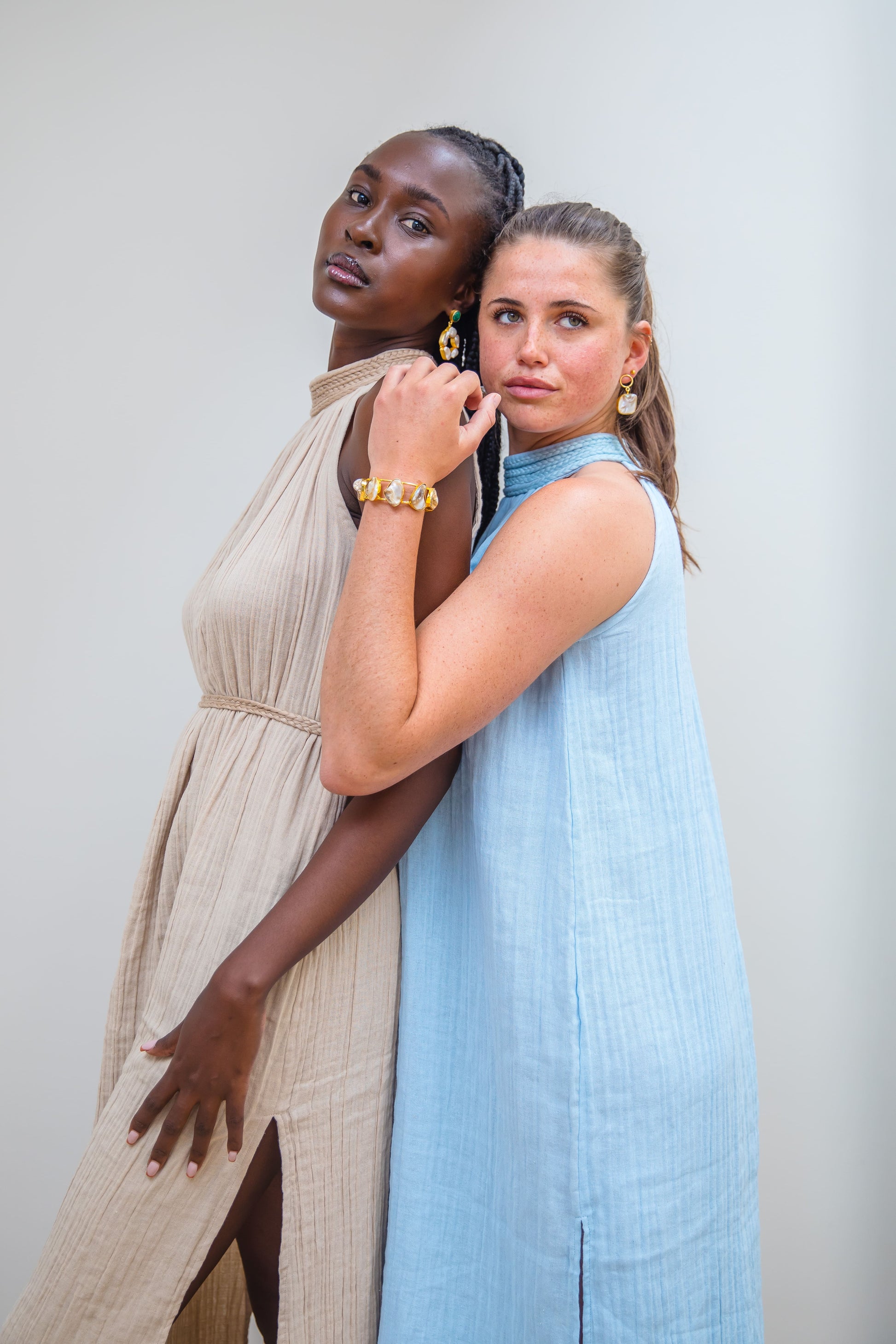 Nairobi halter dress in Sky featuring intricate handwoven neckline and double cheesecloth body.