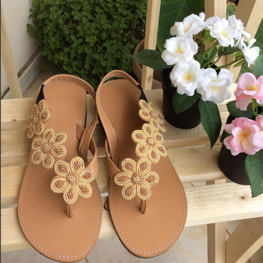 Class apart sandals in beige smooth leather and Maasai beaded strap