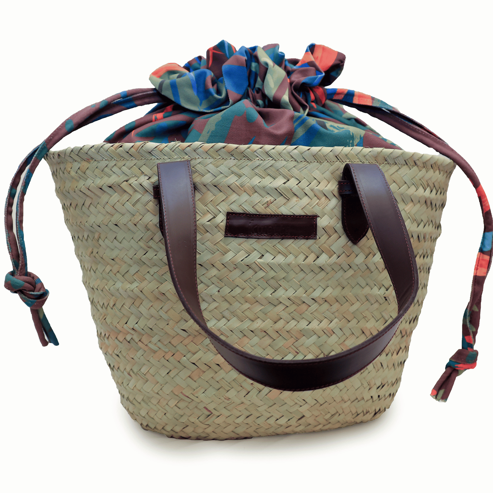 Kapu basket handcrafted with sisal, leather handles and canvas