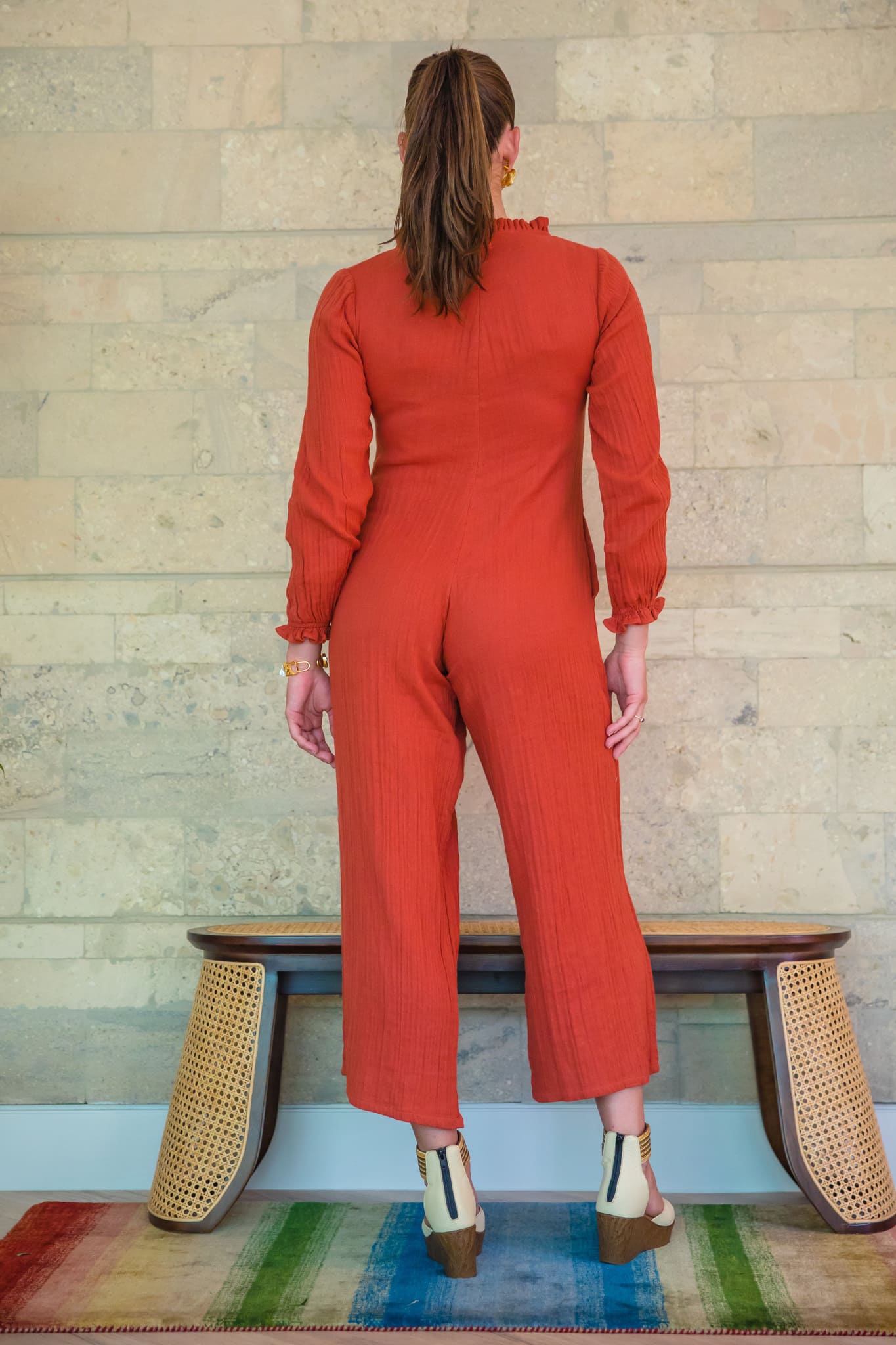 Terracotta Cairo jumpsuit crafted from soft, temperature-adaptive double cheesecloth.