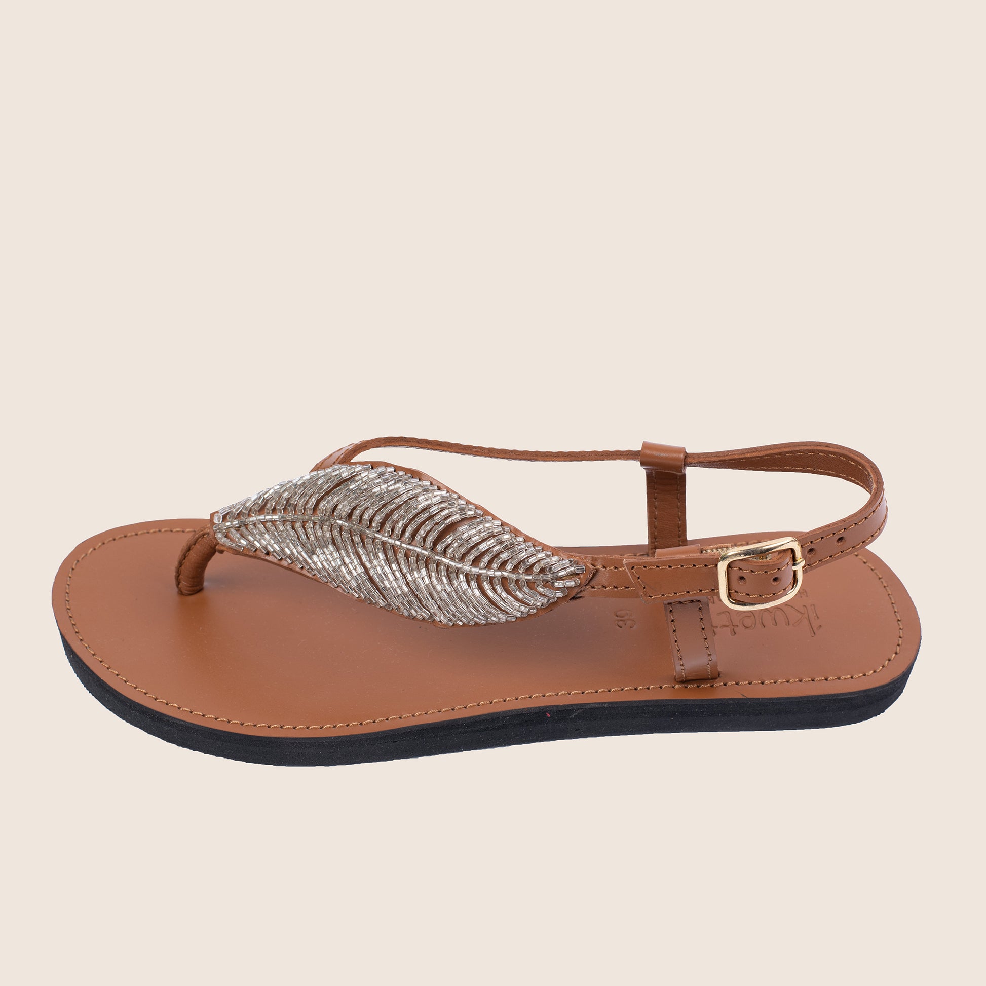 Tropical luxe sandals in Caramel smooth leather with a leaf style beaded strap.
